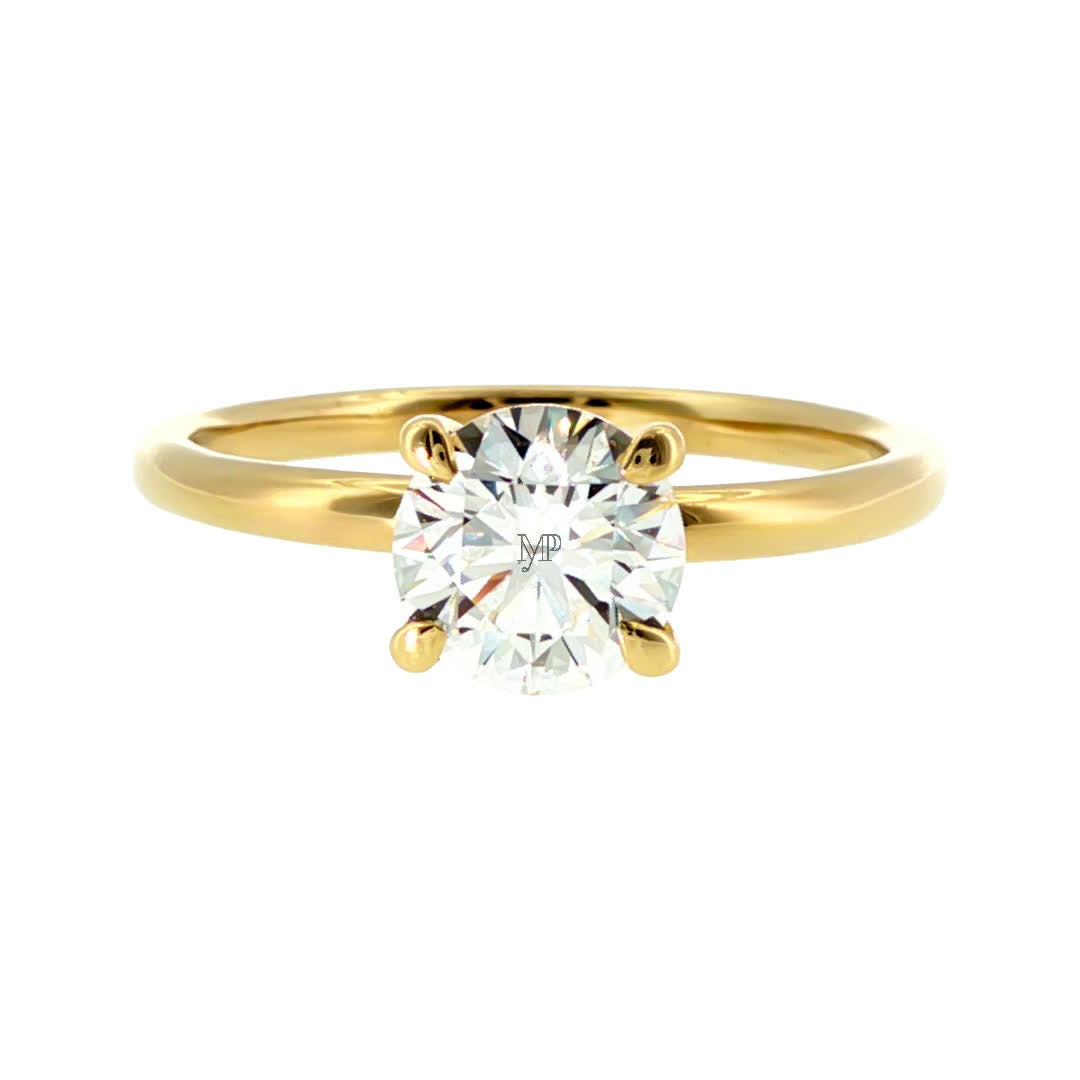 Anillo "Nilo" oro amarillo 14K, diamante lg 1.00ct Bluish
